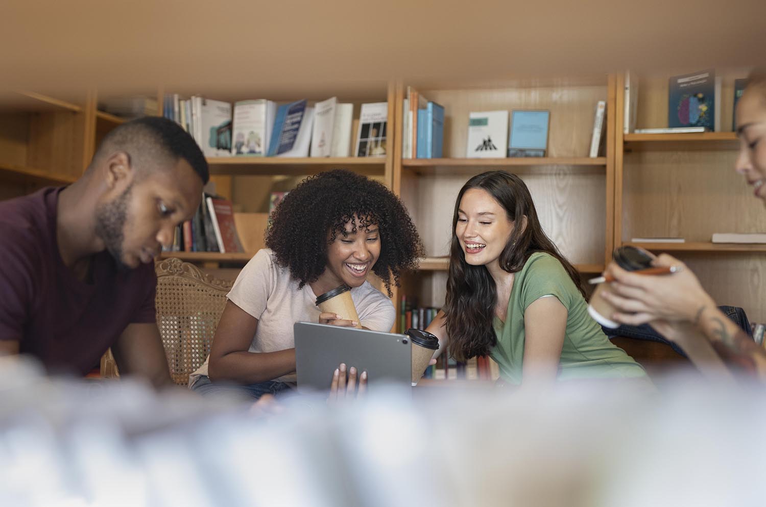 Students collaborating in a library